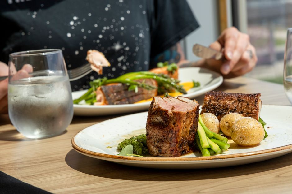 Succulent meat dish served with fresh vegetables and potatoes